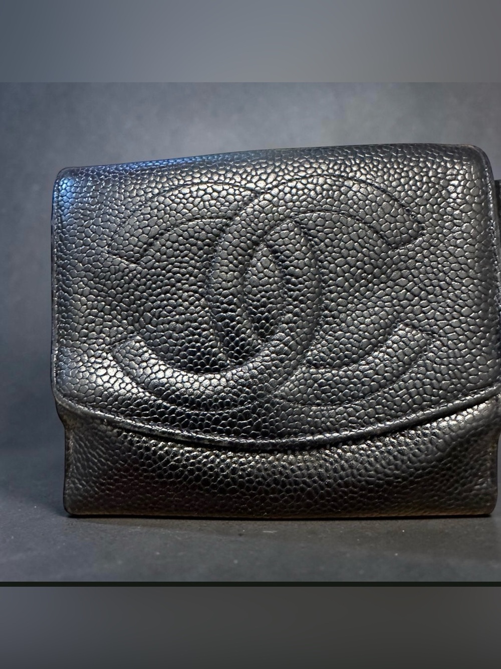 CHANEL Black pebble Quilted Caviar Leather Clutch with CC Emboss